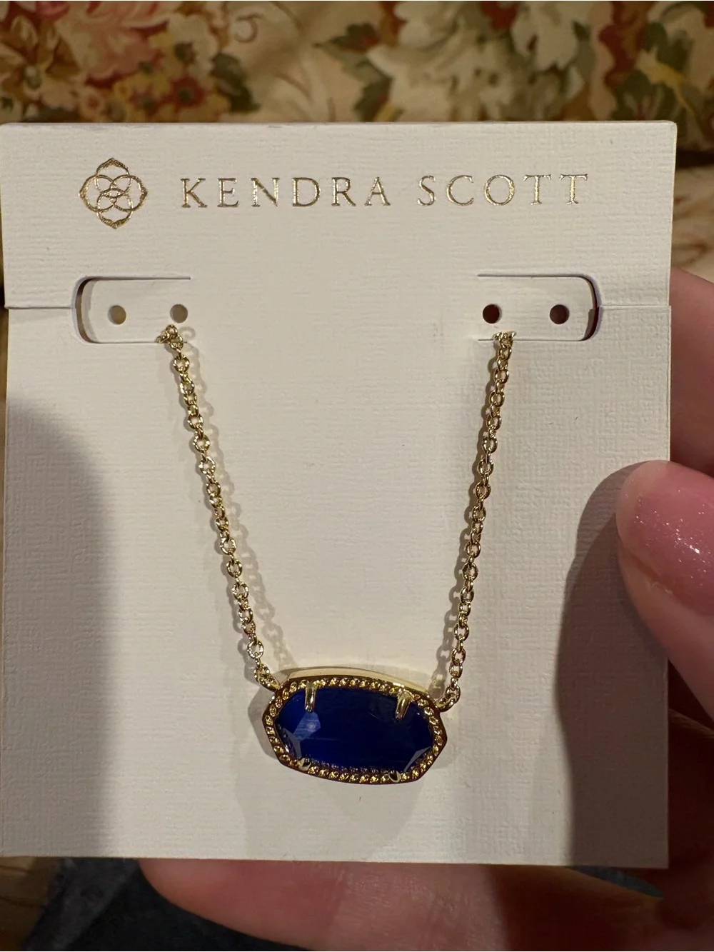 Kendra Scott Gold Necklace with Deep Blue Stone